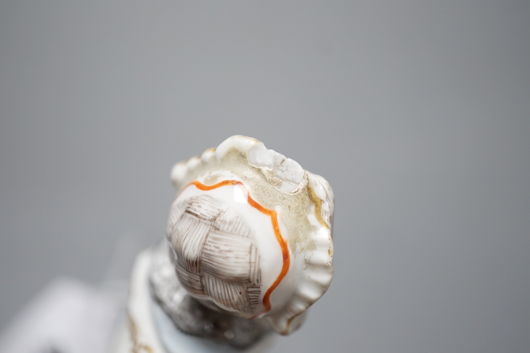 A late 18th / early 19th century Meissen ‘Frauen Kopf’ porcelain cane handle on plinth base, unmarked, 12.5cm tall
